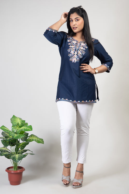 Dark Blue Coloured Premium Kashmiri Short cotton Kurti Styled with small V-slit cut at Front and graced with Multi Colour Floral Aari Work embroidery.