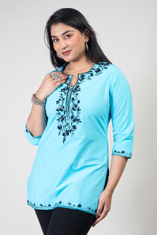 Sky Blue Premium Kashmiri Short cotton Kurti Styled with small U-slit cut at front and graced with Double shaded Dark Blue colour Floral Aari Work embroidery