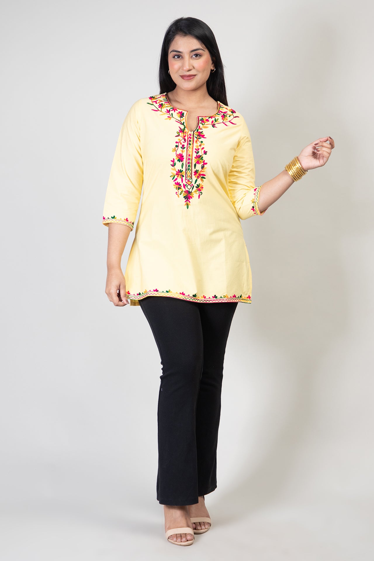 Yellow Premium Kashmiri Short cotton Kurti Styled with small U-slit cut at front and graced with Multi colour Floral Aari Work embroidery