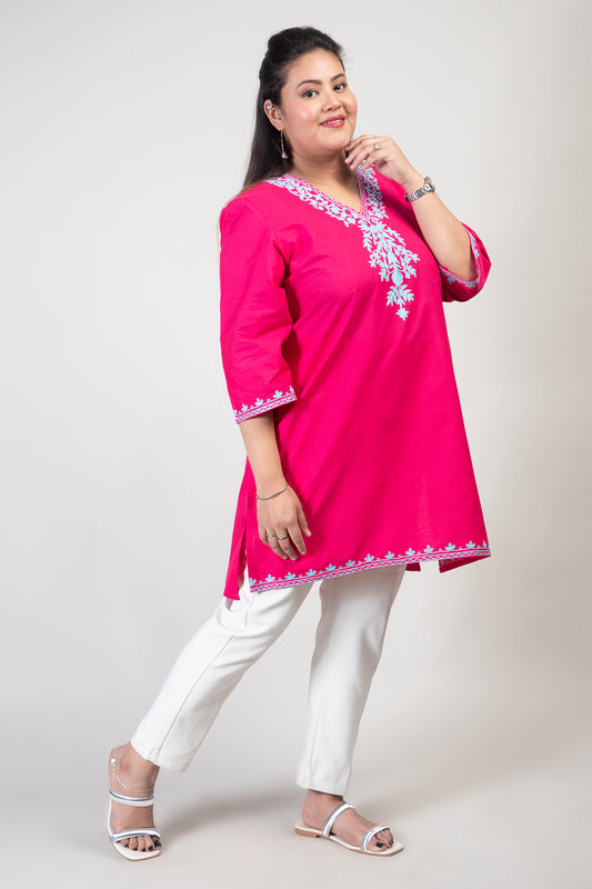 Dark Pink Premium Kashmiri Short cotton Kurti Styled with V-Neck cut at front and graced with Light Blue colour Floral Aari Work Embroidery