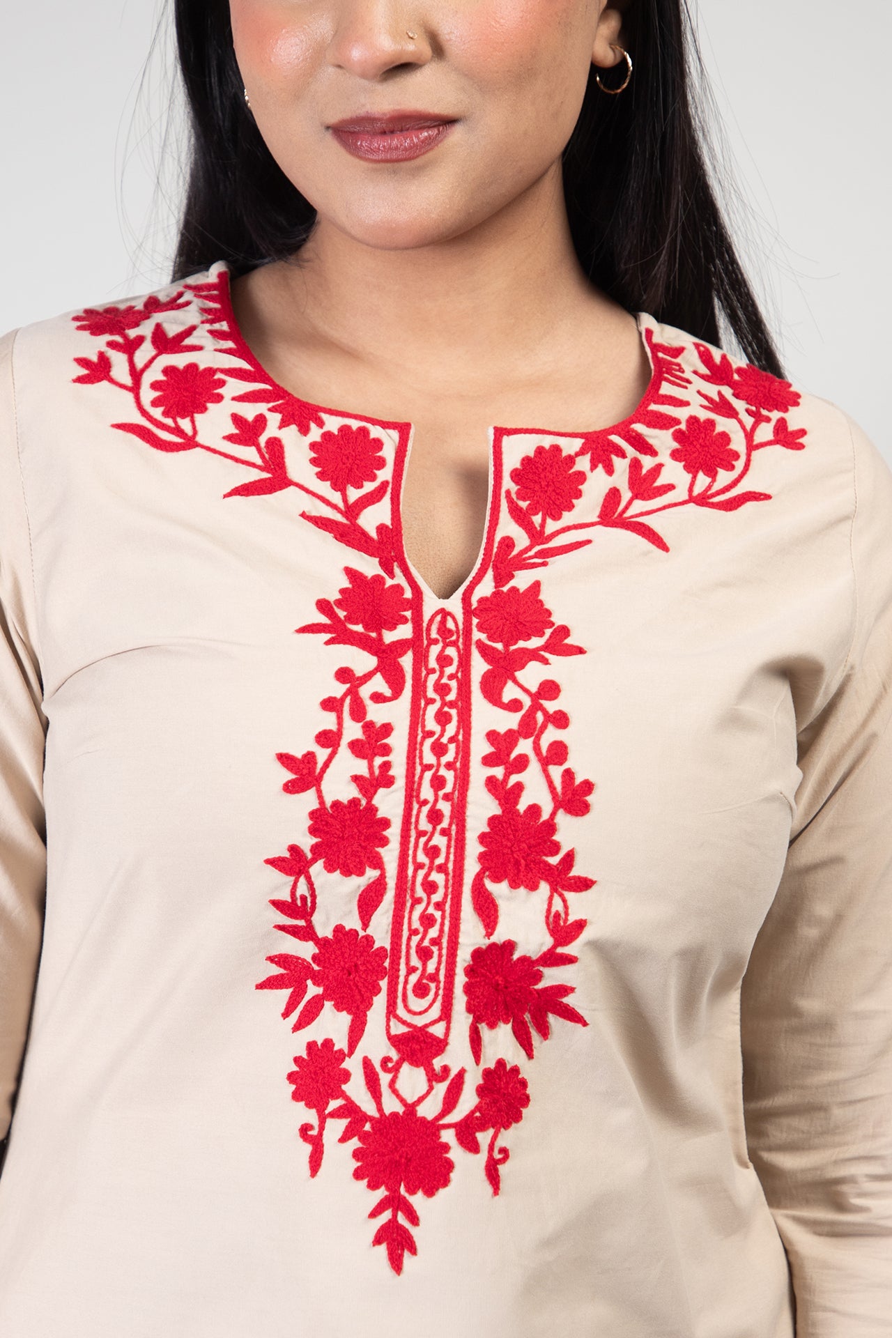 Sand Brown Premium Kashmiri Short cotton Kurti Styled with small U-slit cut at front and graced with Dark Red colour Floral Aari Work embroidery
