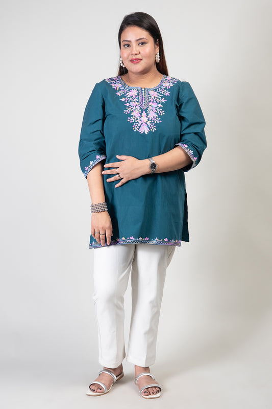 Teal Green Coloured Premium Kashmiri Short cotton Kurti Styled with small V-slit cut at Front and graced with Double shaded Multi Colour Floral Aari Work embroidery