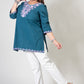 Teal Green Coloured Premium Kashmiri Short cotton Kurti Styled with small V-slit cut at Front and graced with Double shaded Multi Colour Floral Aari Work embroidery