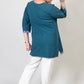 Teal Green Coloured Premium Kashmiri Short cotton Kurti Styled with small V-slit cut at Front and graced with Double shaded Multi Colour Floral Aari Work embroidery